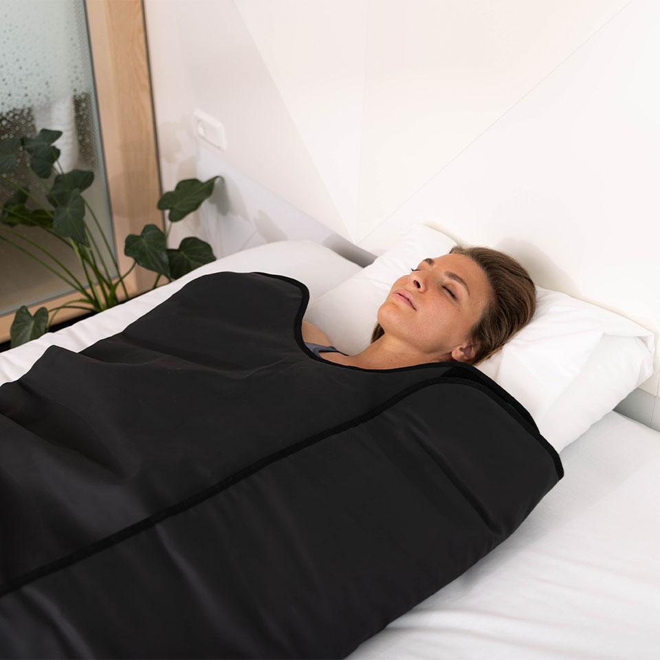 Nordic Therm Deluxe infrarødt saunatæppe med 144 energisten hos Aurora Wellness
